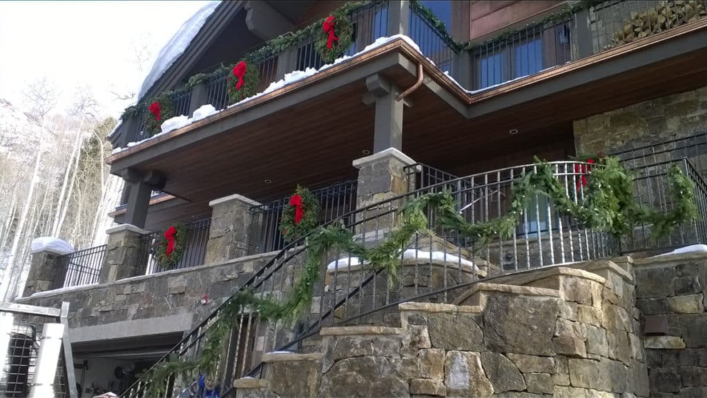 Holiday landscape lighting in Colorado.